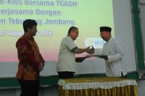 Penandatanganan kerja sama Program Layanan Keuangan Digital PENARA e-Kios bersama TCASH